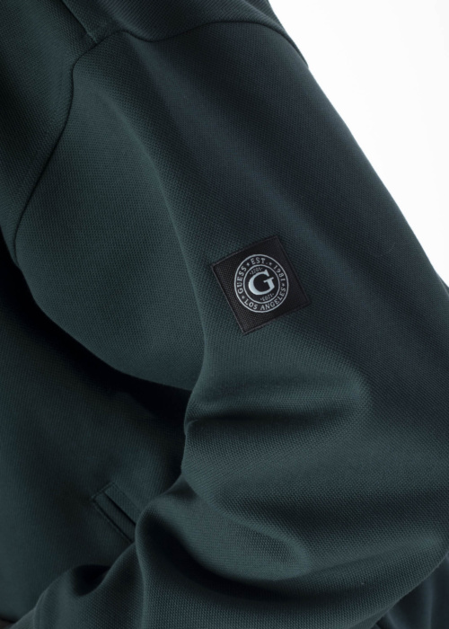 Guess pavasario-rudens striukė Logotipas