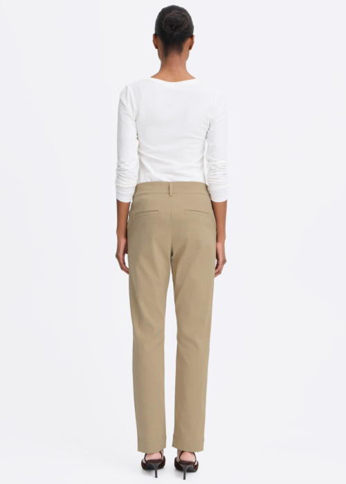 b.young kelnės Dixi