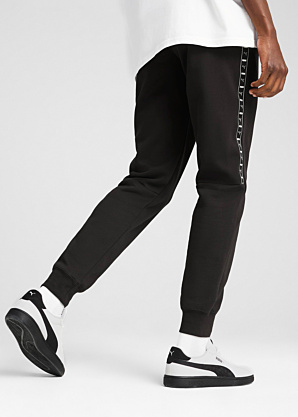 Puma sportinės kelnės Ess Tape Fl Cl